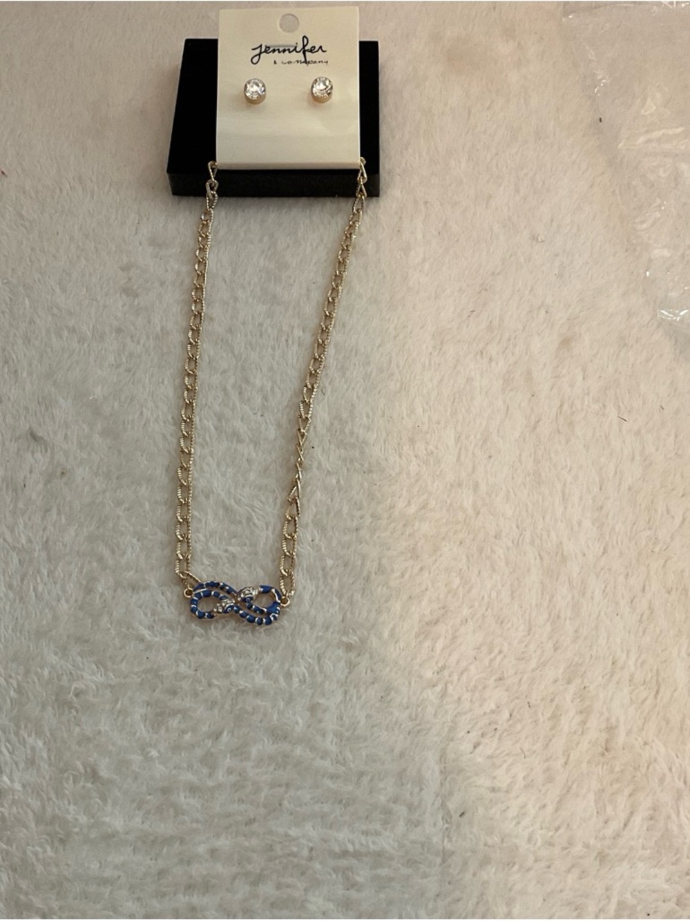 Jenni Gold-Tone Infinity Necklace with Blue Crystal Accents